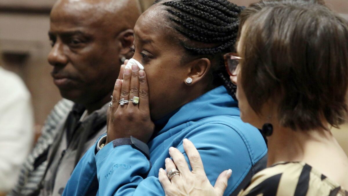 Katrina Johnson weeps at the South Lee County Courthouse in Keokuk, Iowa, on Nov. 3, 2017, after a jury found Jorge Sanders-Galvez guilty in the death of Johnson's transgender child, 16-year-old Kedarie Johnson.