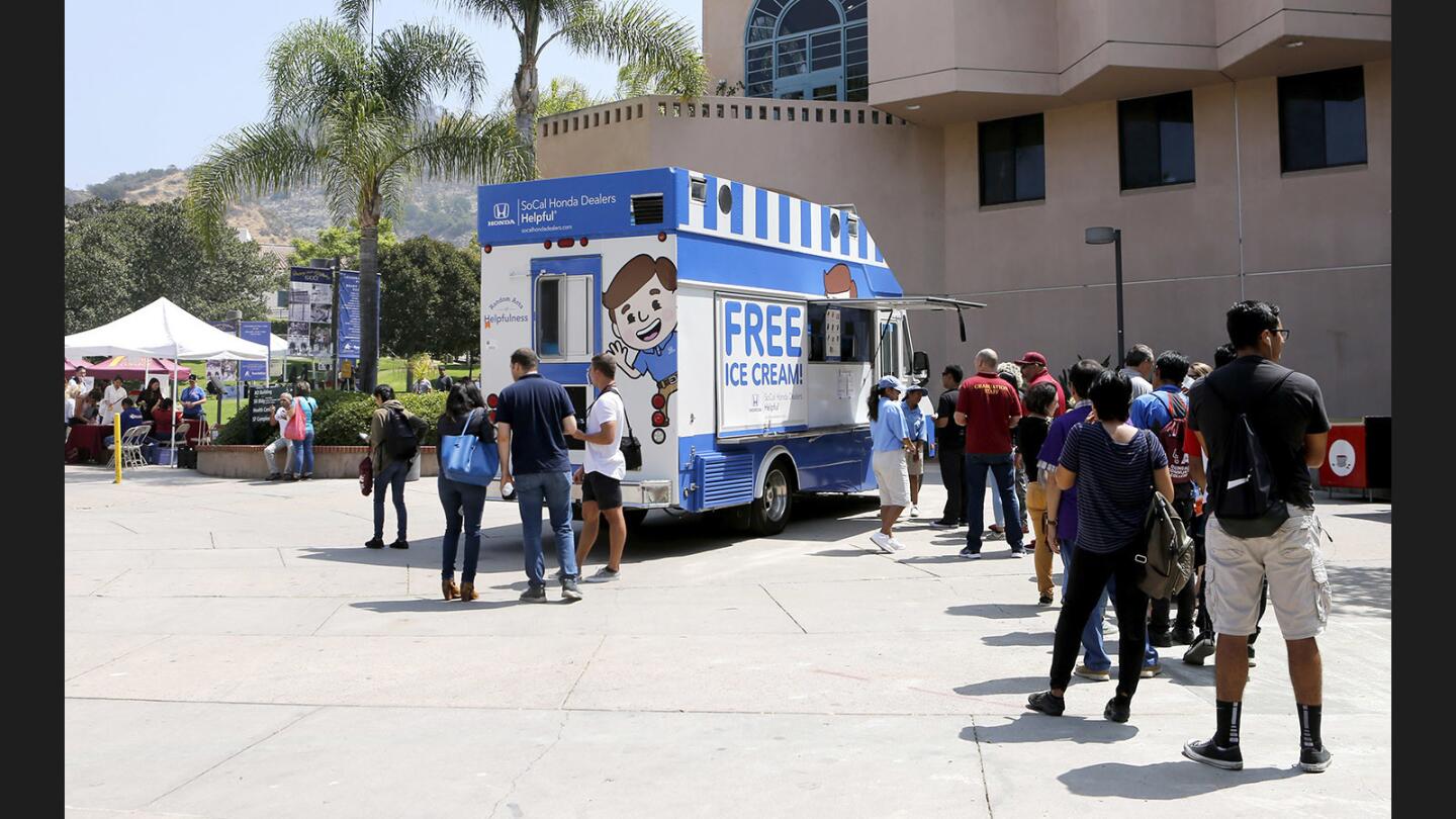 The Helpful Honda ice cream truck pulled up to Glendale Community College to give away free ice cream to anyone who lined up, at the Glendale campus on Friday, Aug. 25, 2017.