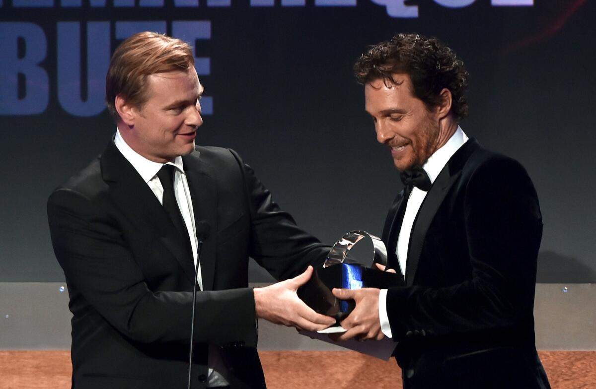 "Interstellar" director Christopher Nolan presents Matthew McConaughey with the American Cinematheque Award on Oct. 21 at the Beverly Hilton Hotel in Beverly Hills.