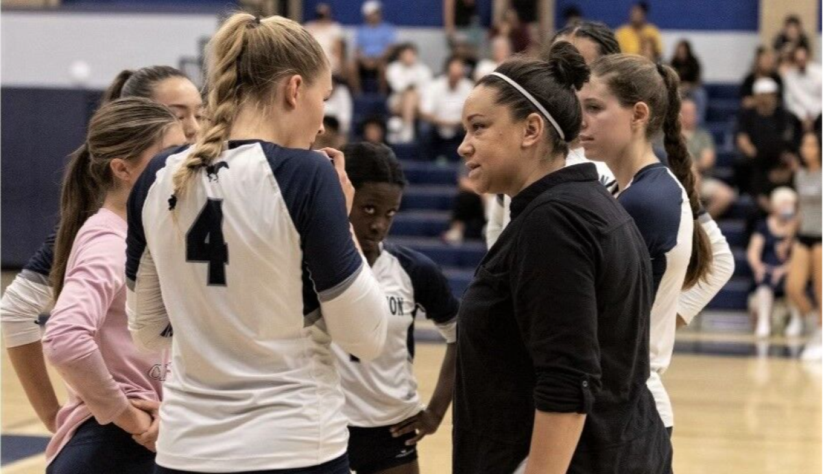 Sierra Canyon High girls' volleyball coach Stefanie Wigfall talkes to her team during a timeout.