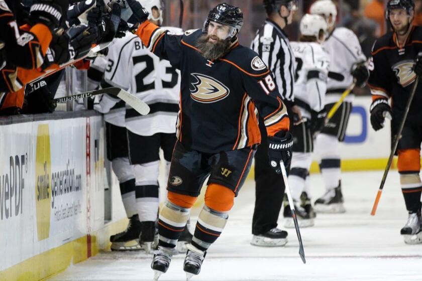 Anaheim Ducks' Patrick Eaves, center, celebrates his goal with teammates during the first period of an NHL hockey game against the Los Angeles Kings, Sunday, April 9, 2017, in Anaheim, Calif. (AP Photo/Jae C. Hong)