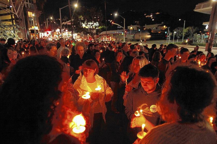 Mourners attend a candlelight vigil for camera assistant Sarah Jones on Sunset Boulevard in Hollywood this month.