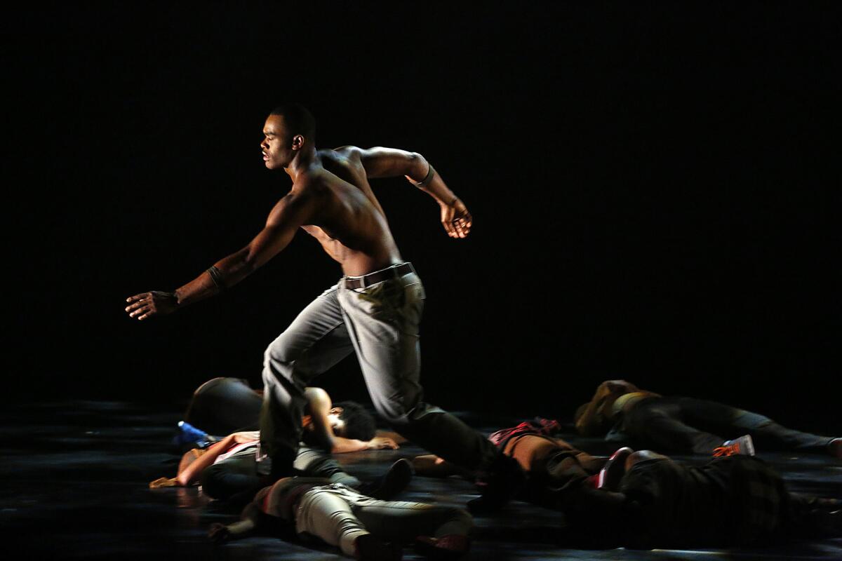 Jamar Roberts in Alvin Ailey American Dance Theater's "Exodus," a compelling opening to the program Thursday at Segerstrom Center for the Arts in Costa Mesa.