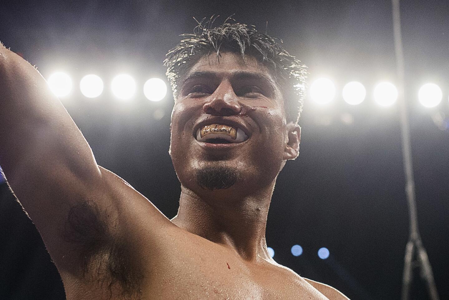 Mikey Garcia, celebrates his victory over Adrien Broner during a 140-pound boxing box bout Saturday, July 29, 2017, in New York. (AP Photo/Andres Kudacki)