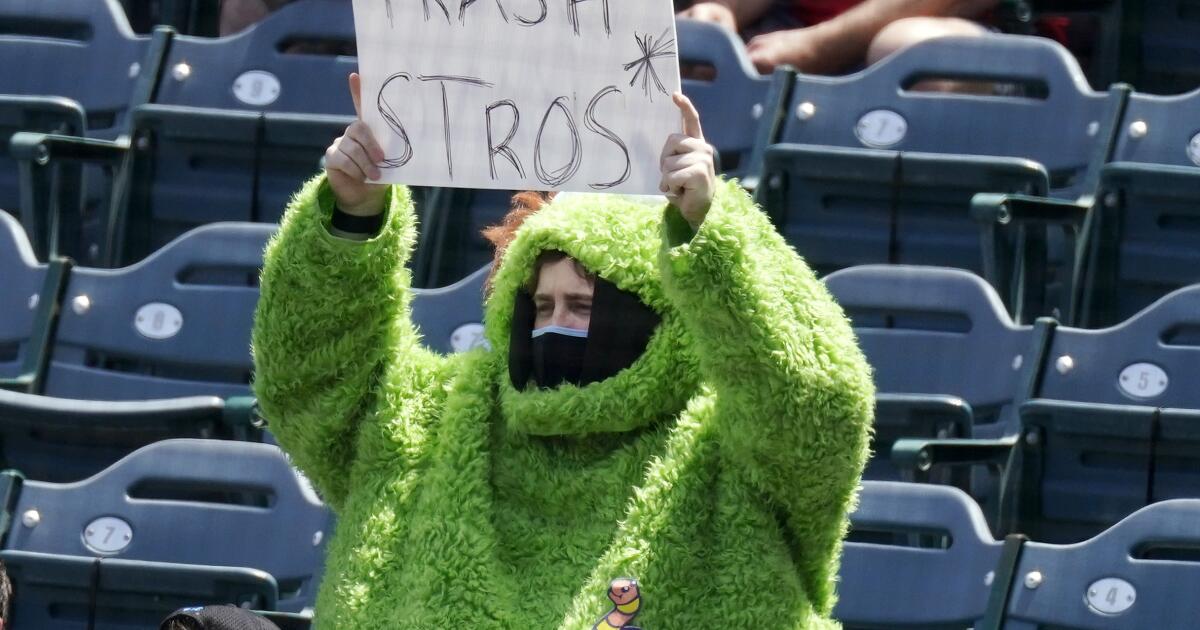 Oscar the Grouch turns up to help Angels fans trash Astros - The San Diego  Union-Tribune