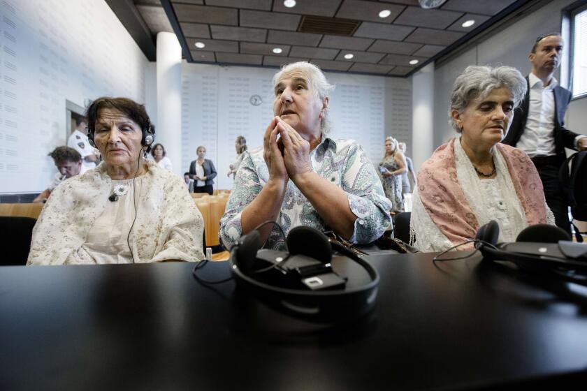 Members of the Mothers of Srebrenica in court for the verdict on Wednesday in The Hague, which found the Dutch government liable in the 1995 deaths of 300 Muslim men and boys.