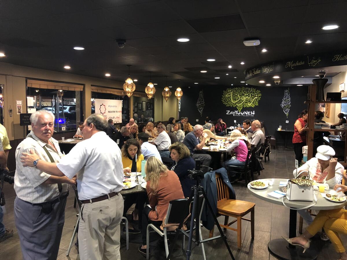 People dine at Olive Tree Restaurant.