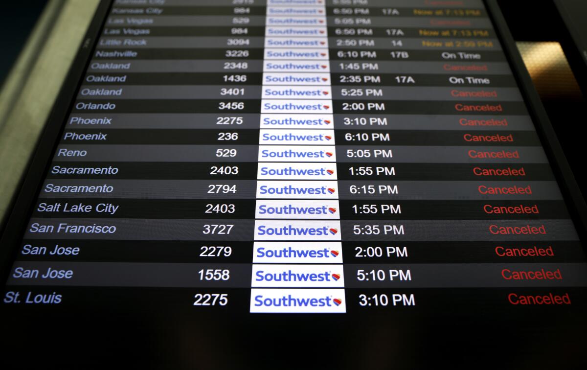 A screen showing canceled Southwest Airlines flights at LAX