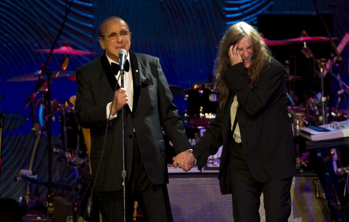 Clive Davis, with Patti Smith at a Grammy gala, will be coming to the Los Angeles area on a tour for his new book.