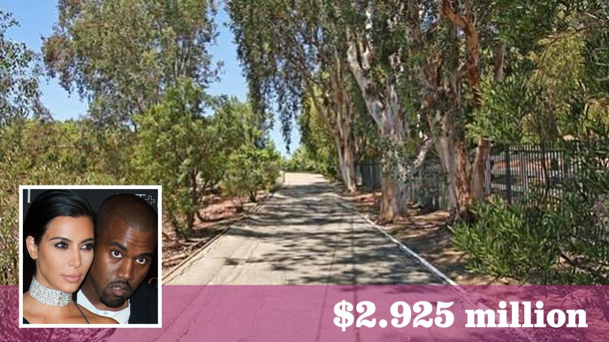The couple have paid $2.925 million for a property that backs their Hidden Hills compound.