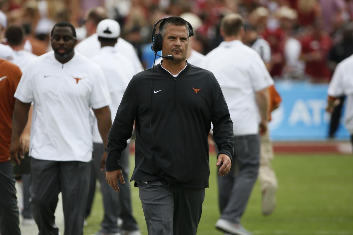 Texas Longhorns defensive coordinator Todd Orlando walks on the sideline during a game.