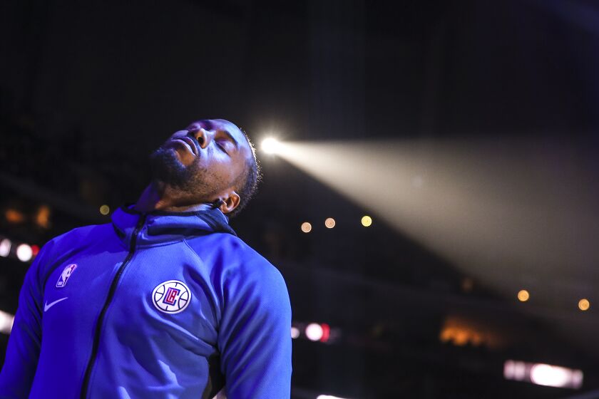 LOS ANGELES, CA, TUESDAY, OCTOBER 22, 2019 - LA Clippers forward Kawhi Leonard (2) stretches during pregame warmups at Staples Center. (Robert Gauthier/Los Angeles Times)