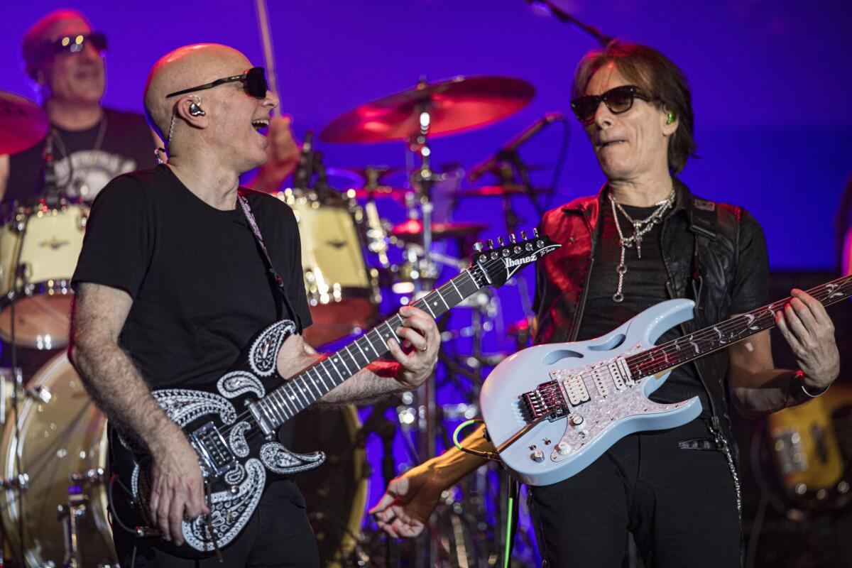 Joe Satriani (L) and Steve Vai perform at The Magnolia on February 07, 2024 in El Cajon