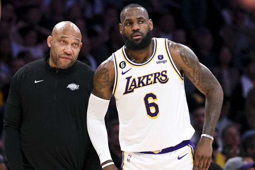 LOS ANGELES, CA - MAY 20: Los Angeles Lakers forward LeBron James, right, talks with head coach Darvin Ham.