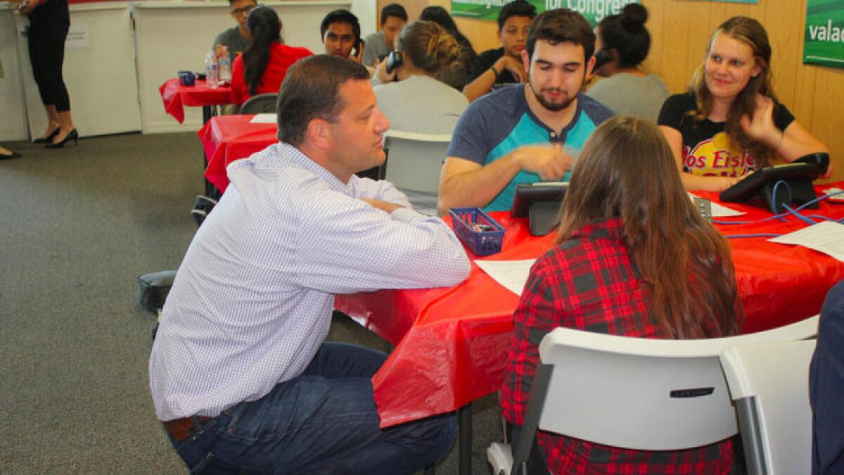Rep. David Valadao (R-Hanford) speaks with high school interns at his Hanford campaign office