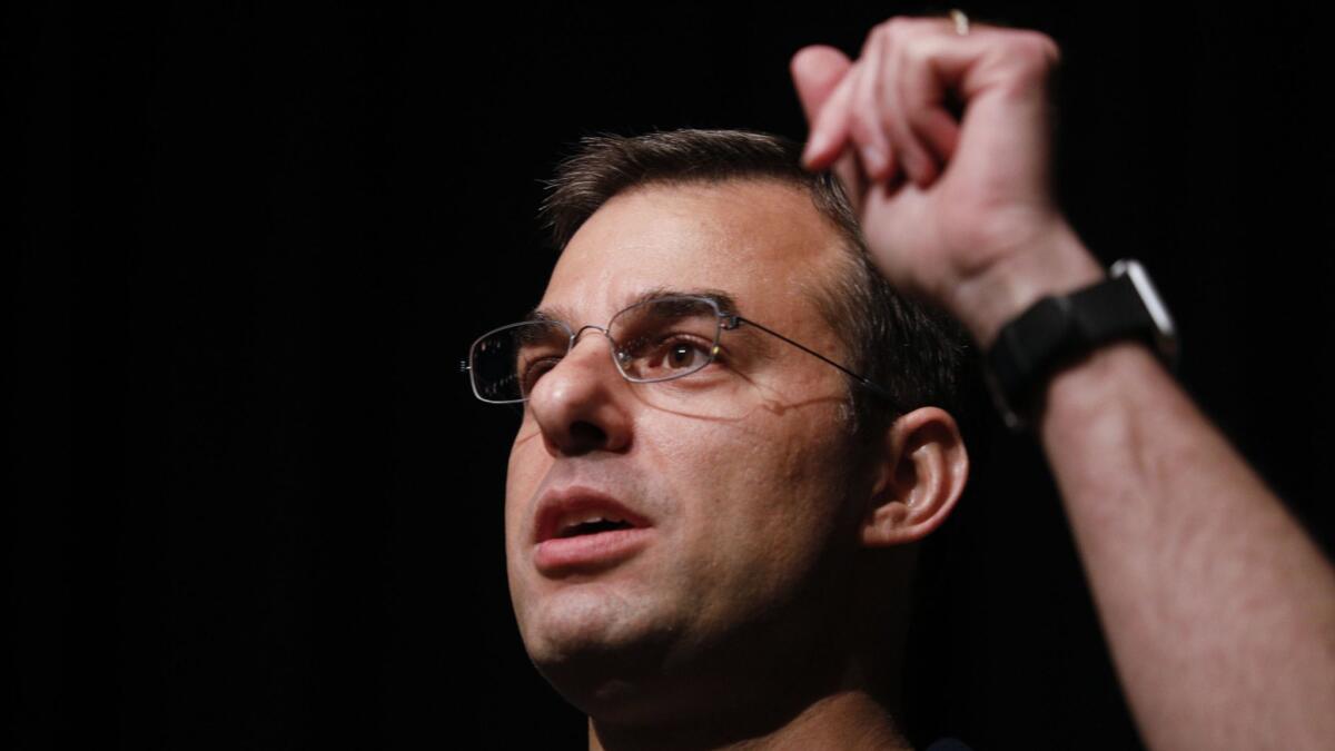 Rep. Justin Amash holds a town hall meeting on May 28 in Grand Rapids, Mich.