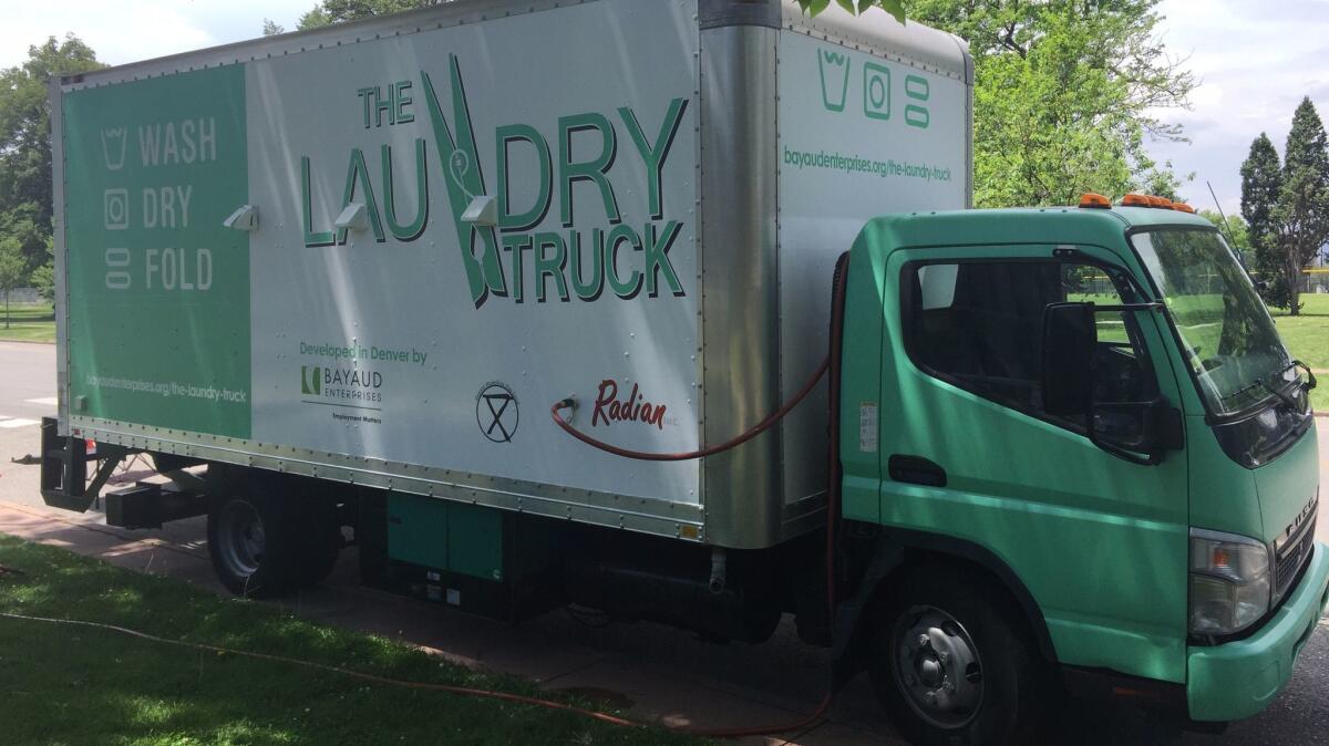 The Laundry Truck holds a dozen industrial washers and dryers and cruises the city of Denver doing laundry for the homeless for free.