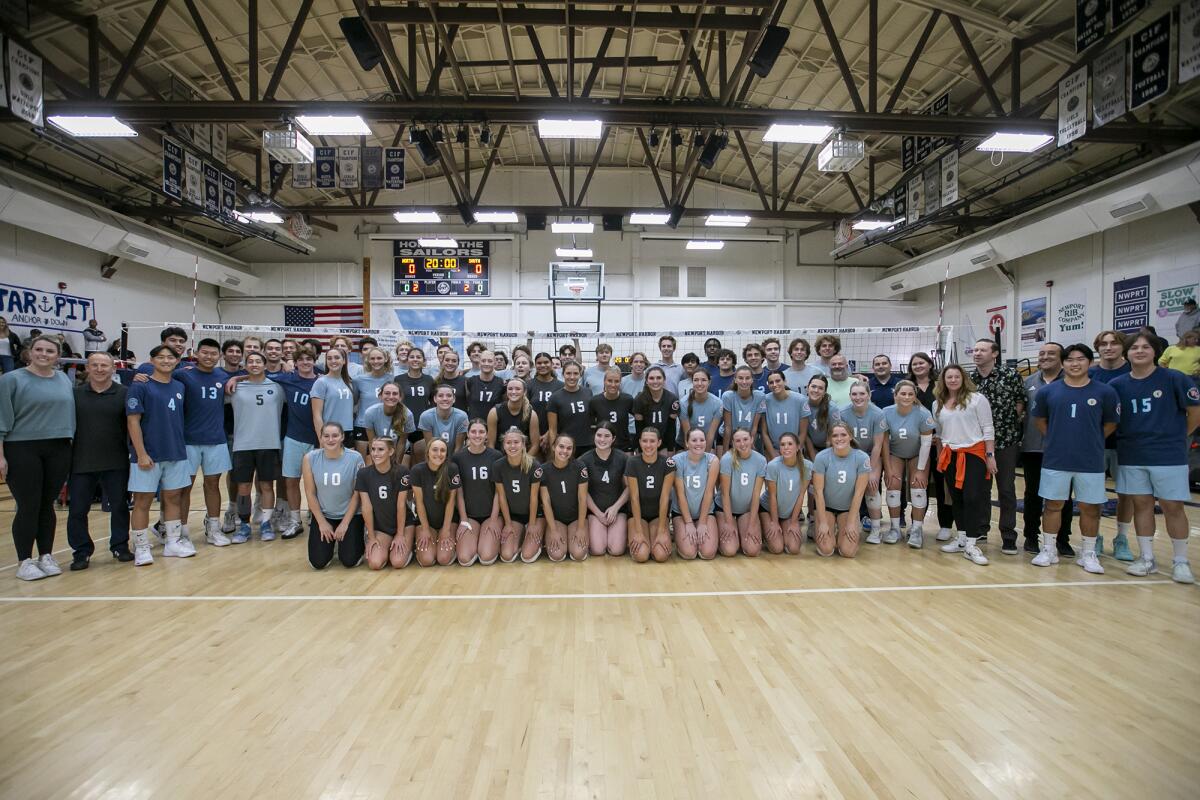 The boys' and girls' Orange County All-Star volleyball teams pose for a photo on Tuesday.