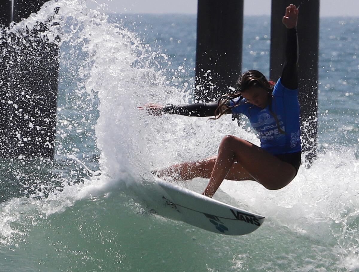 Bella Kenworthy of San Clemente competes in the women's final at the U.S. Open of Surfing on Sunday.