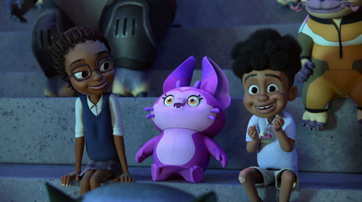 a girl, a stuffed animal and a boy sitting in some stands