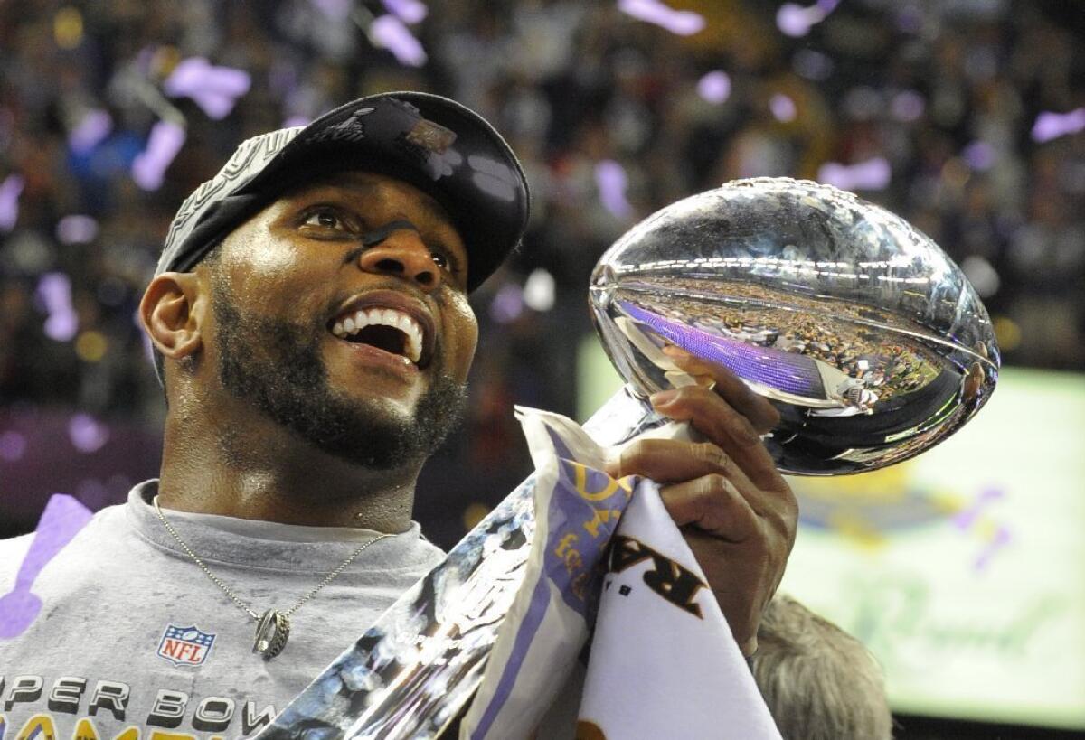 Ray Lewis celebrates the Baltimore Ravens' Super Bowl victory Sunday.