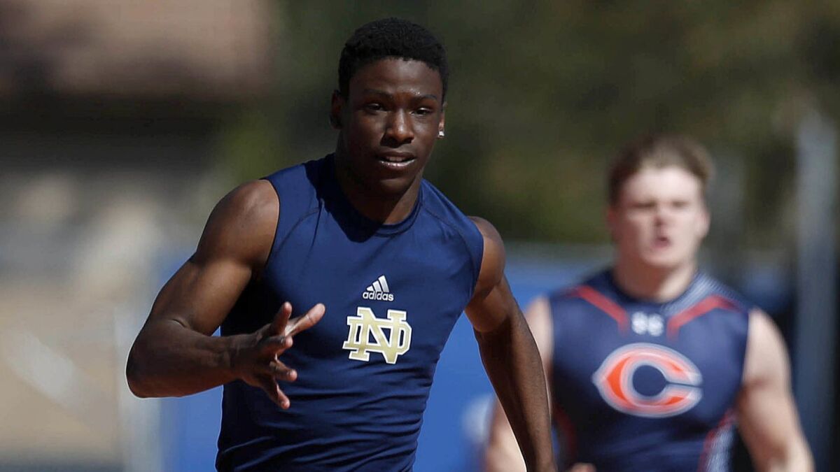 Sherman Oaks Notre Dame’s Christian Grubb competes in the 400-meter relay during a dual meet at Chaminade College Preparatory on March 26.