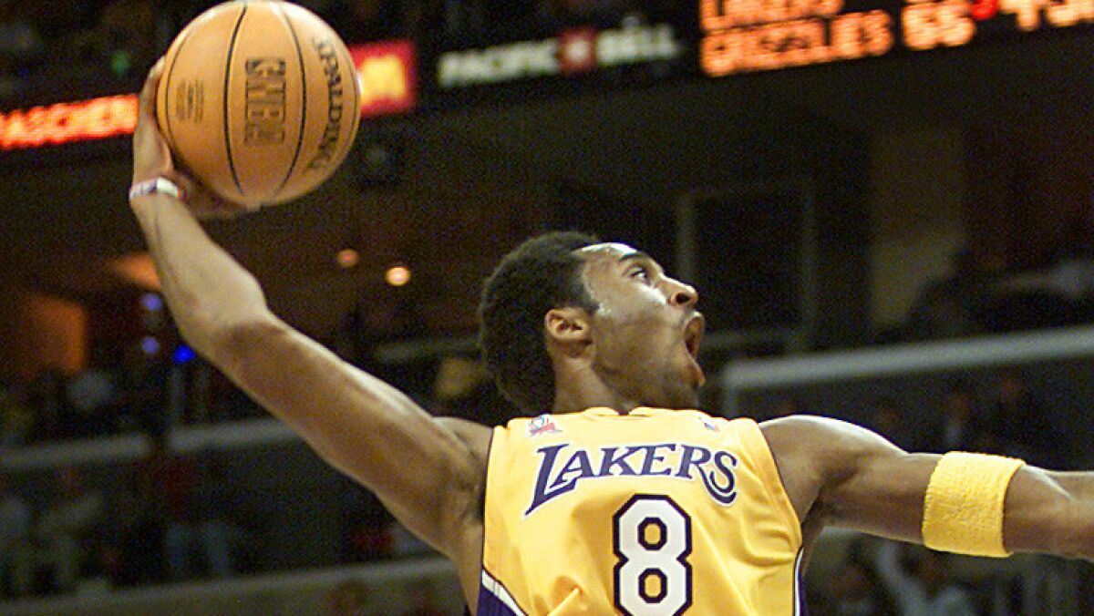 For years rappers have been name-checking Kobe Bryant for his talent and tenacity, both on and off the court. Above:  Bryant during a game at Staples Center on Nov. 9, 2001.