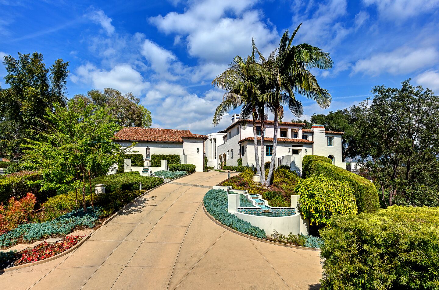 The 1920s mansion blends Spanish Colonial Revival and Art Deco styles across 13,000 square feet.