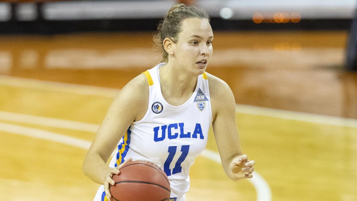 UCLA forward Emily Bessoir controls the ball against Wyoming.