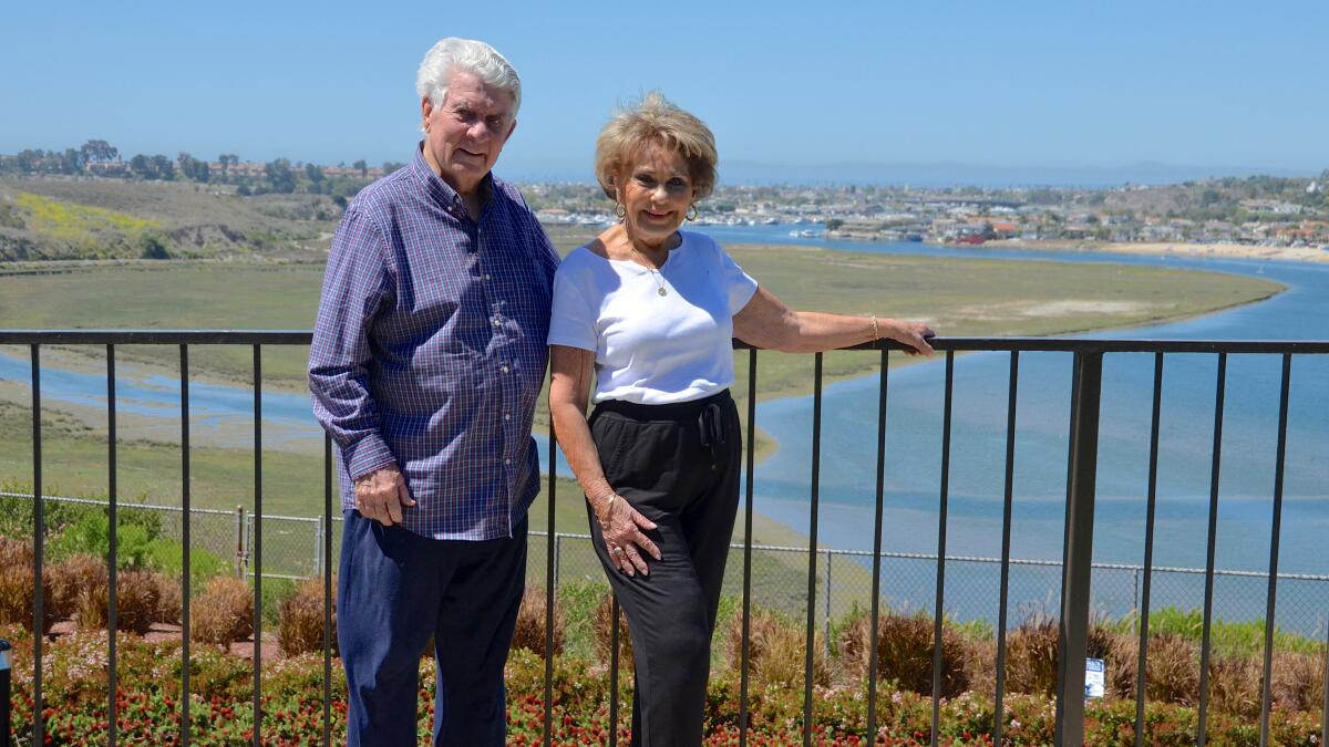 Don and Arline Palmer treasure the view of their Park Newport apartment, where they have lived for 30 years.