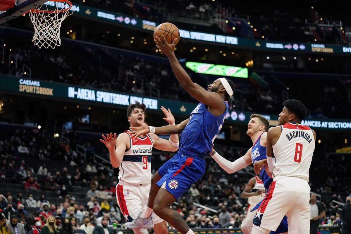 Clippers forward Justise Winslow drives to the basket during a comeback win over the Washington Wizards.