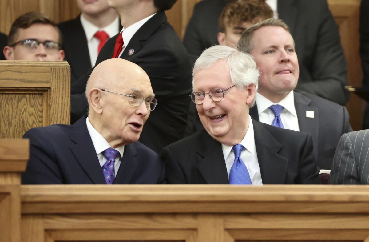 President Dallin H. Oaks, left, first counselor in the First Presidency of The Church of Jesus Christ of Latter-day Saints, talks with Senate Minority Leader Mitch McConnell, R-Ky., before the start of former Sen. Orrin Hatch's funeral at The Church of Jesus Christ of Latter-day Saints Institute of Religion adjacent to the University of Utah in Salt Lake City, Friday, May 6, 2022. (Kristin Murphy/The Deseret News via AP, Pool)