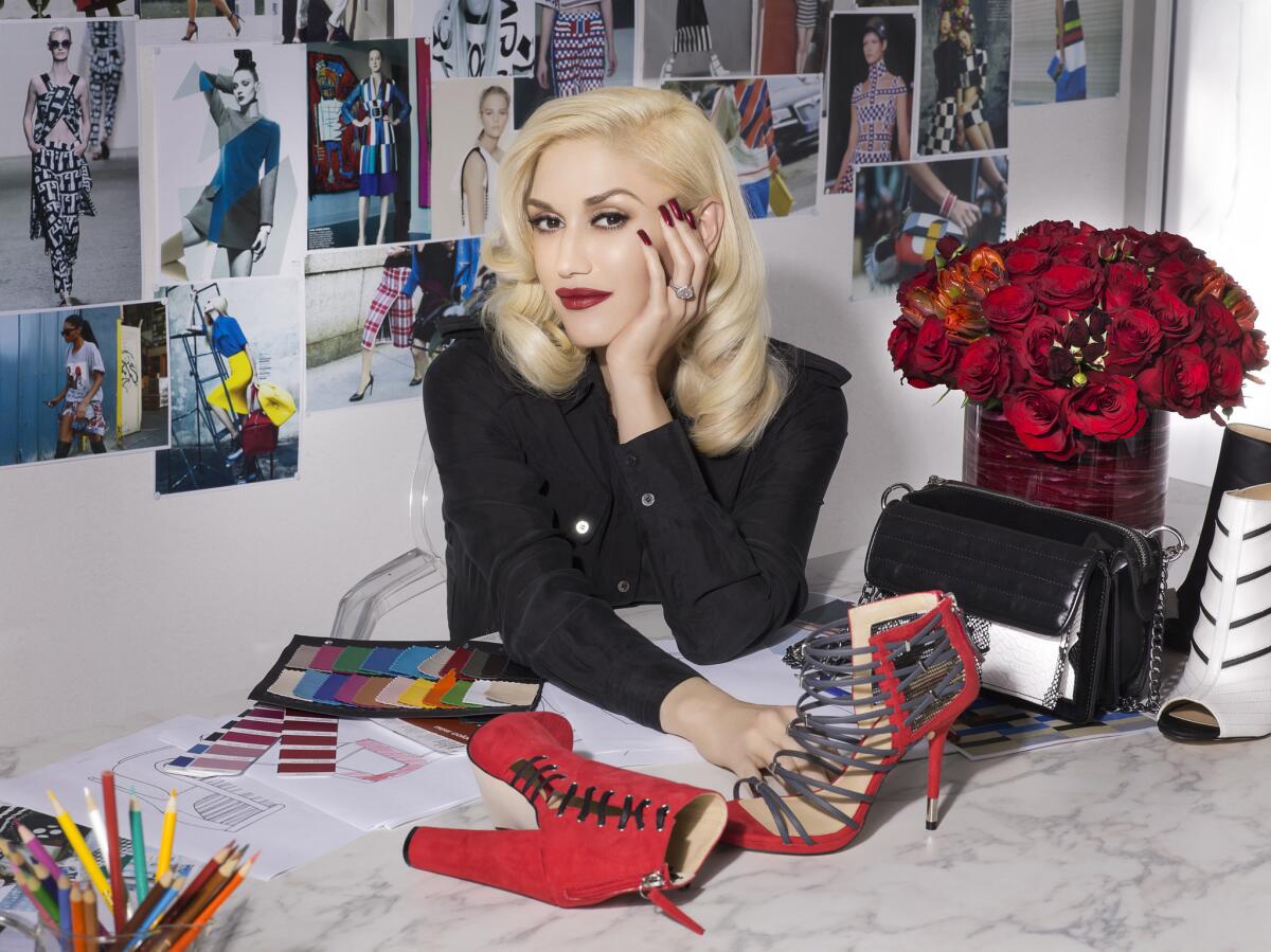 Gwen Stefani is shown with some of her designs for gx by Gwen Stefani for ShoeDazzle.