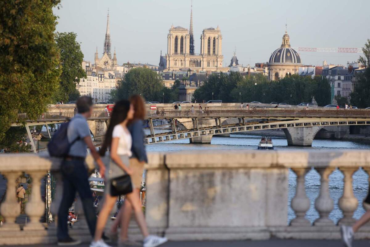 The Notre Dame Cathedral at sunset in Paris on Sept. 3.