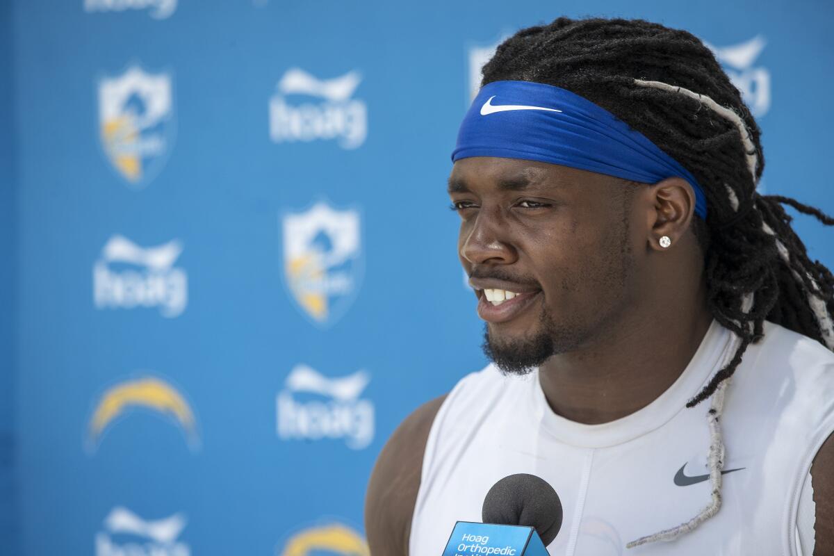 Brian van der Brug  Los Angeles Times MELVIN GORDON says he won’t show up to training camp until he receives a new contract.
