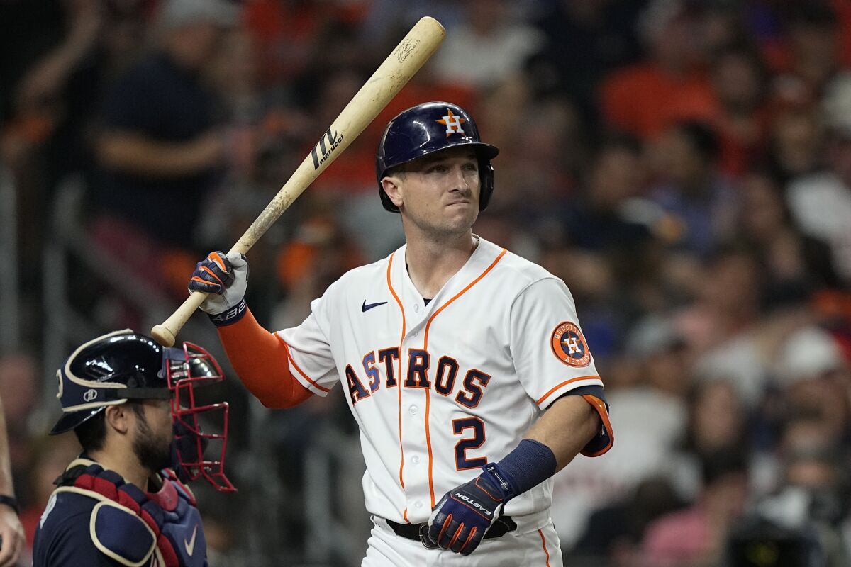 Houston Astros' Alex Bregman reacts after striking out during the fifth inning of Game 1 in baseball's World Series between the Houston Astros and the Atlanta Braves Tuesday, Oct. 26, 2021, in Houston. (AP Photo/David J. Phillip)
