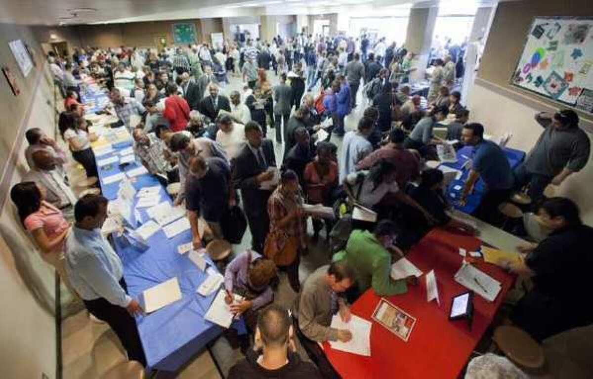 Job seekers gather for employment opportunities at the 11th annual Skid Row Career Fair at the Los Angeles Mission on May 31.