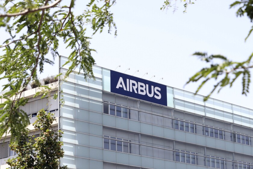 FILE - The logo of Airbus group is displayed in Toulouse, south of France, July 9, 2020. Airbus says aircraft deliveries are rising slightly and airlines are ordering more planes, showing that they are confident in the long-term outlook for air travel. For now, the pandemic is still hurting international air travel. Airbus, which is based in France, said Monday, Jan. 10, 2022 that it delivered 611 passenger jets in 2021, an 8% increase over 2020 deliveries. (AP Photo/Manuel Blondeau, file)