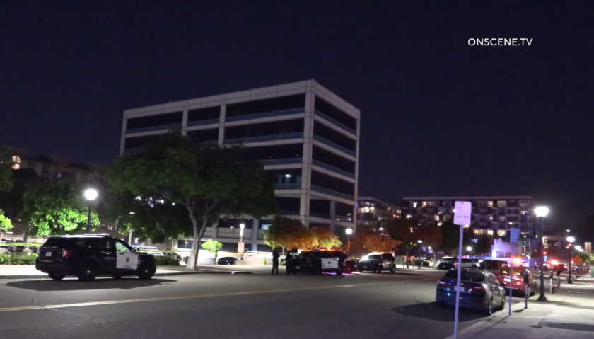 San Diego police said a man was shot Sunday night at police headquarters. 