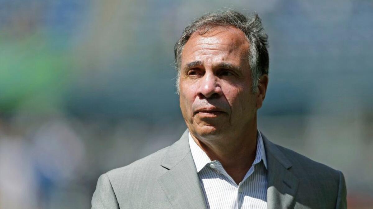 Coach Bruce Arena is being followed to the U.S. national team by four Galaxy assistants.