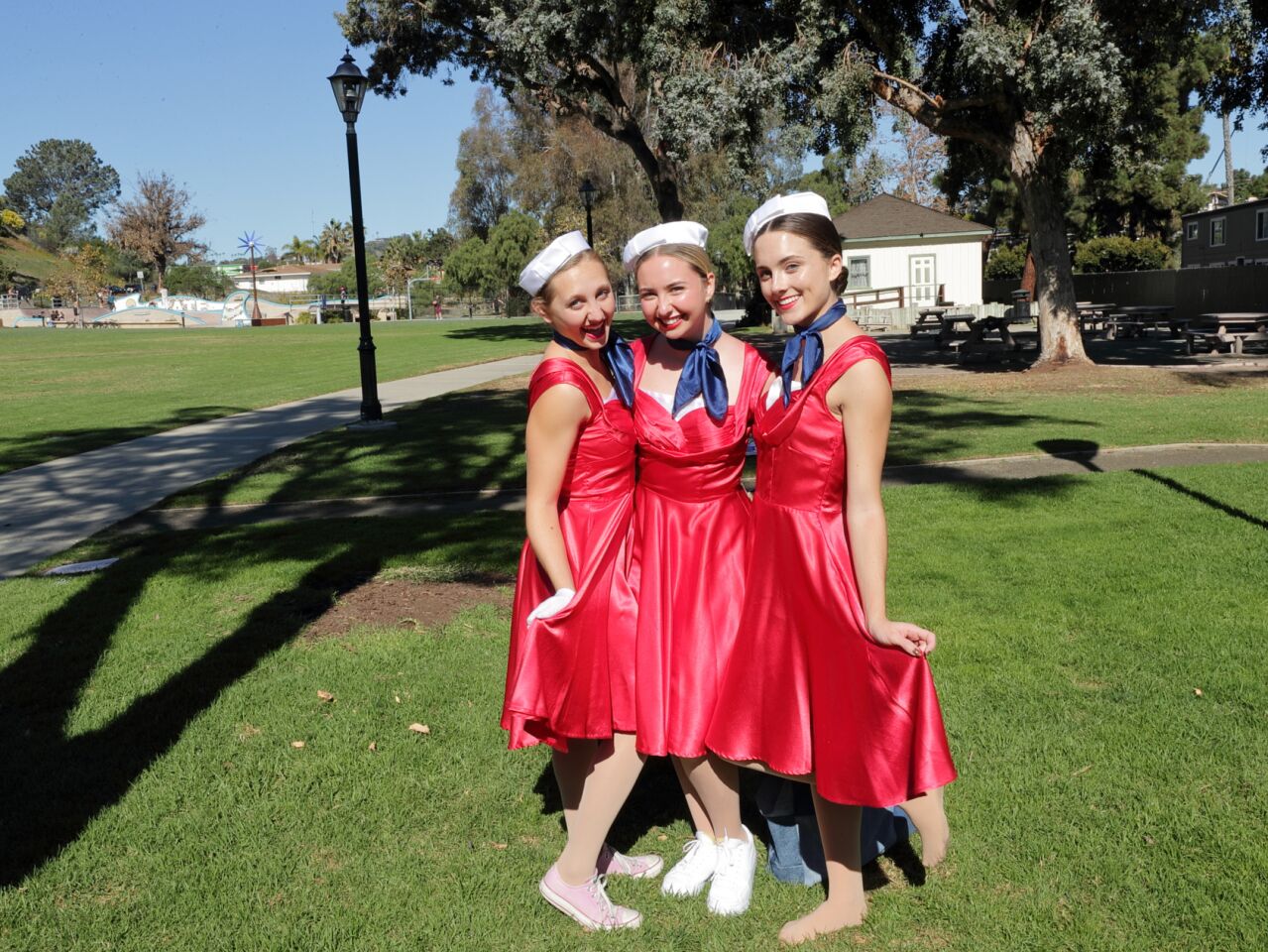 Kylie Kennard, Sandy Cameron, and Roby Kloer from the Santa Fe Christian School Dance Troupe
