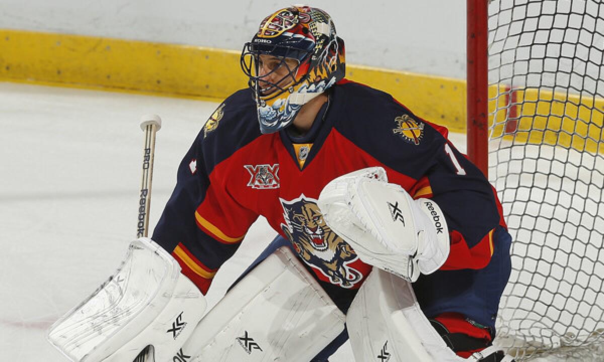 Hall of Fame former Panthers goalie Roberto Luongo gets between