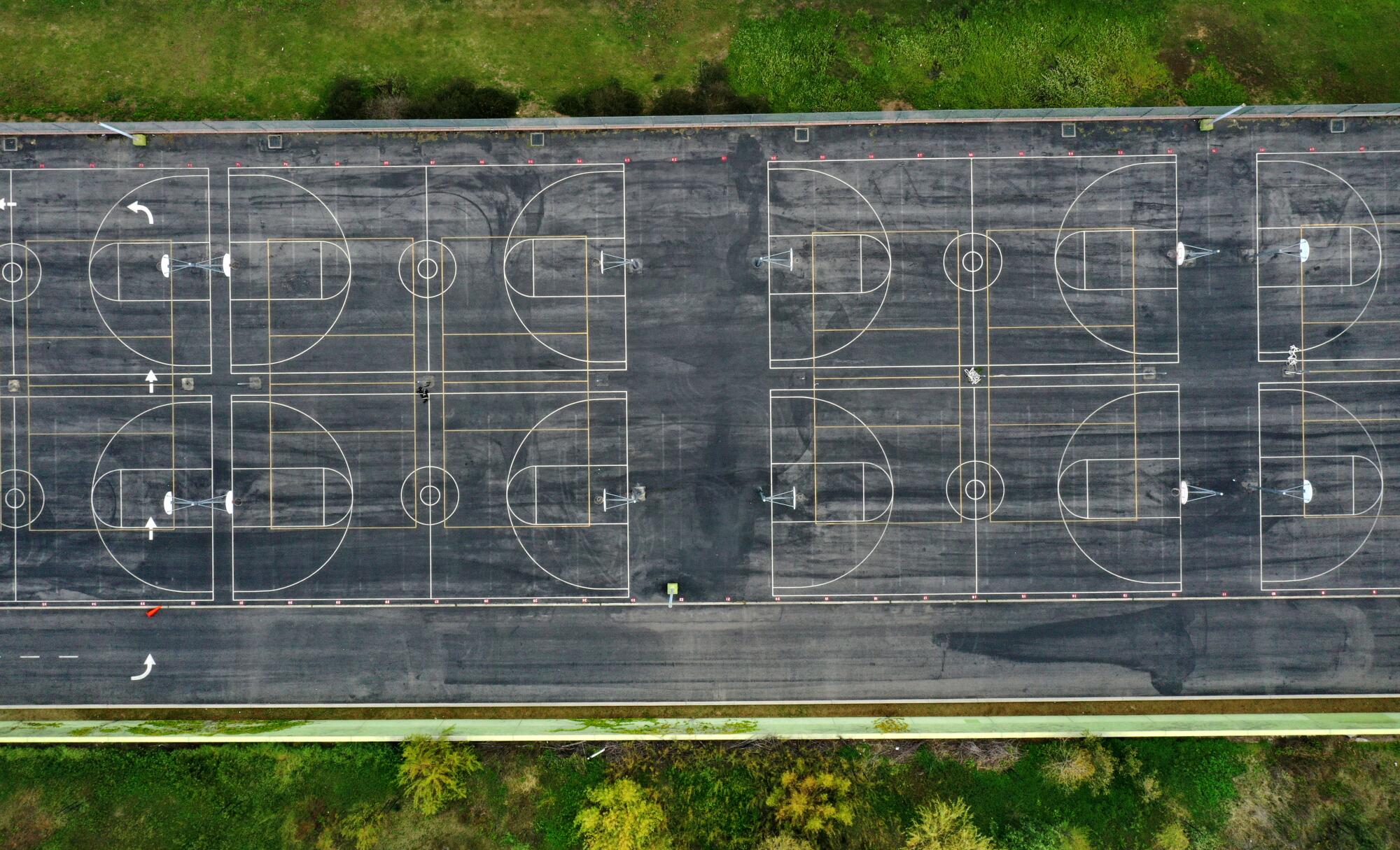 The basketball courts at Roybal Learning Center are empty with schools closed