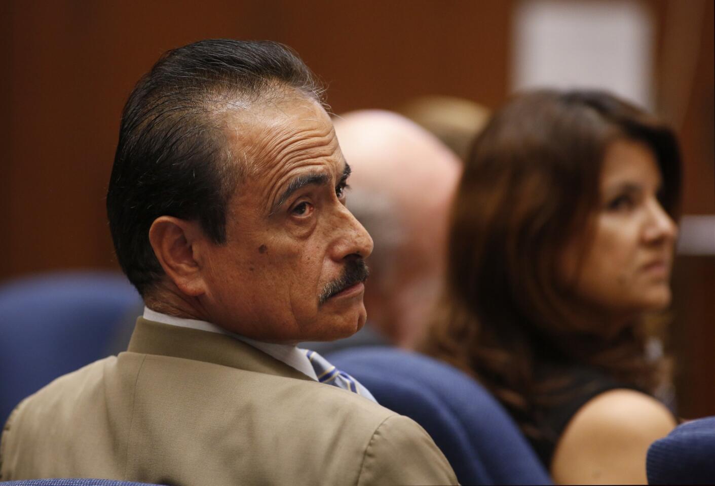 Richard Alarcon, left, and his wife, Flora Montes de Oca Alarcon, at the couple's perjury trial in downtown L.A. on July 8.