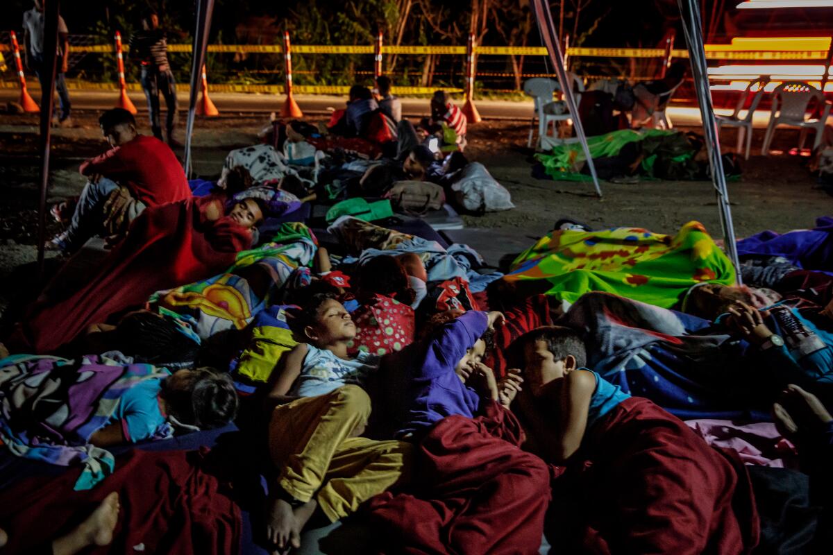 Venezuelan children sleep at the campground in Bochalema, Colombia, May 2019.