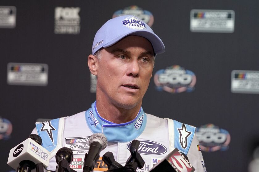 FILE - Kevin Harvick speaks during NASCAR Daytona 500 auto racing media day at Daytona International Speedway, Wednesday, Feb. 16, 2022, in Daytona Beach, Fla. Harvick will know if 2023 will be his final NASCAR season before he goes too Daytona in February. “I don't really have a clear answer on that right now,” the 2014 Cup champ said about his future Thursday, Dec. 1, before the NASCAR Awards. (AP Photo/John Raoux, File)