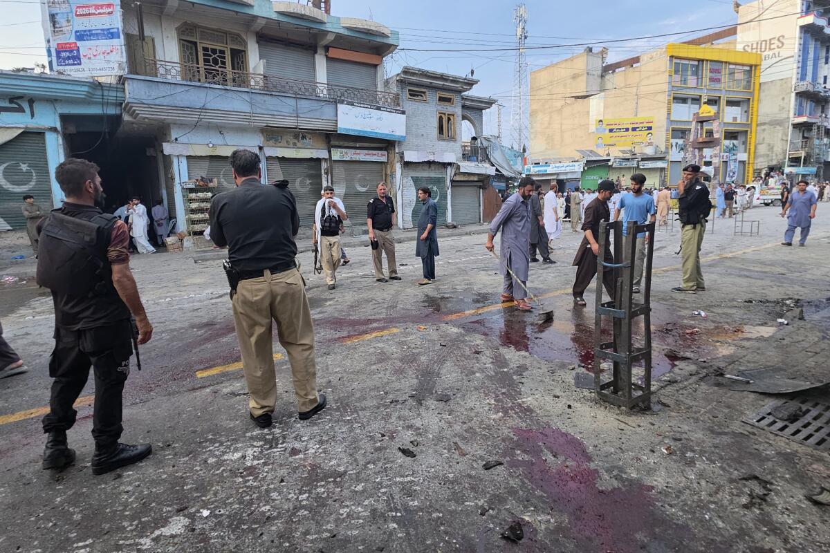 Suicide bomber strikes antimilitant rally in Pakistan; 14 killed - Los Angeles Times