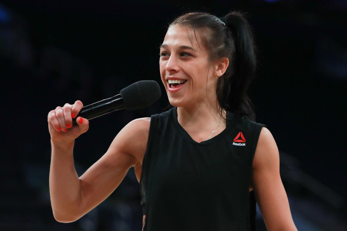 Joanna Jedrzejczyk talks to the Madison Square Garden crowd during UFC 205 open workouts on Wednesday.