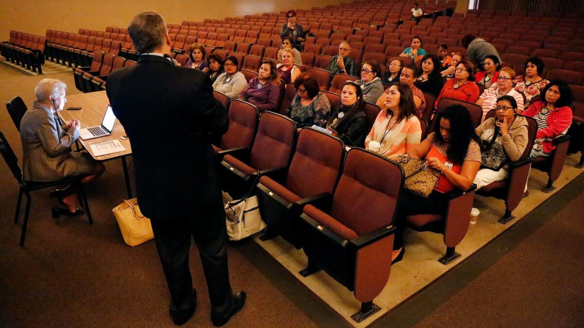 Hank Gmitro, standing, of Hazard, Young, Attea and Associates, leads a public forum in 2015, during the previous search for an L.A. Unified superintendent.
