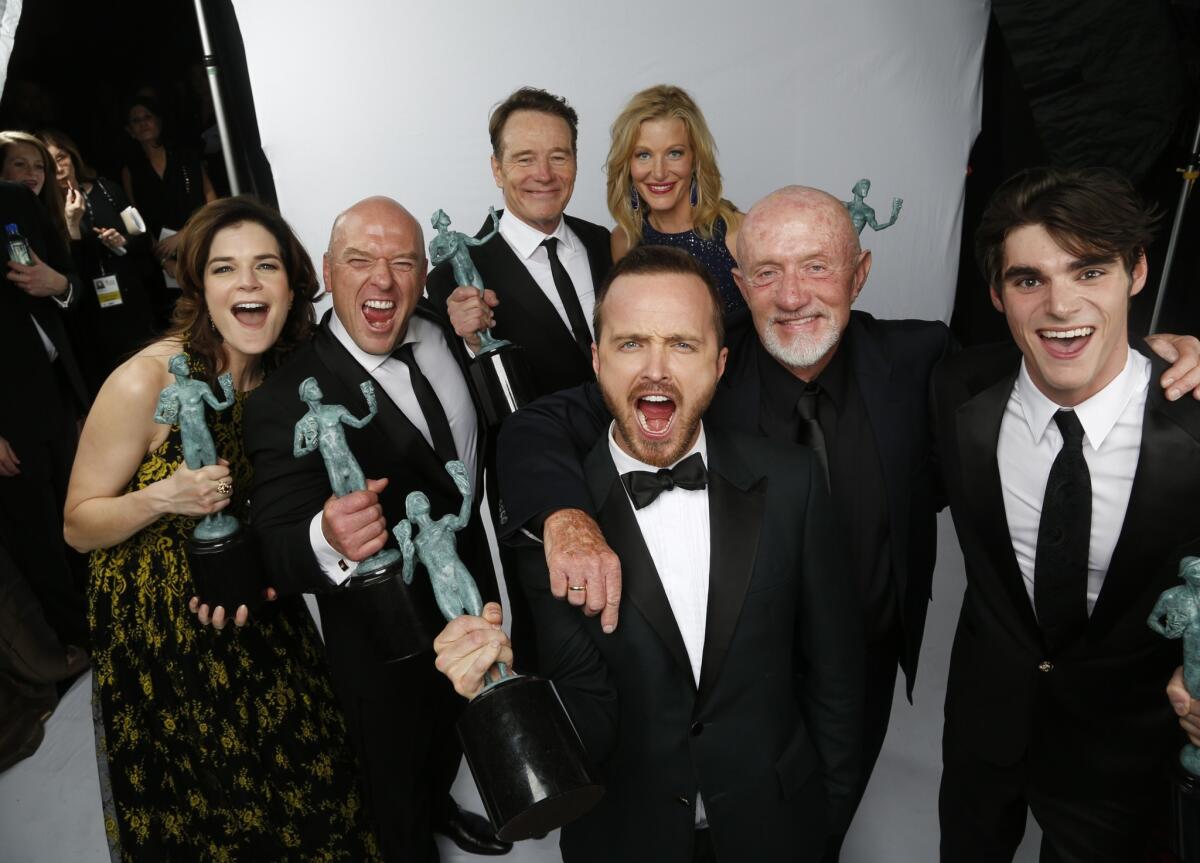 The cast of "Breaking Bad" celebrates after winning the TV drama ensemble prize at the 20th Screen Actors Guild Awards in Los Angeles.